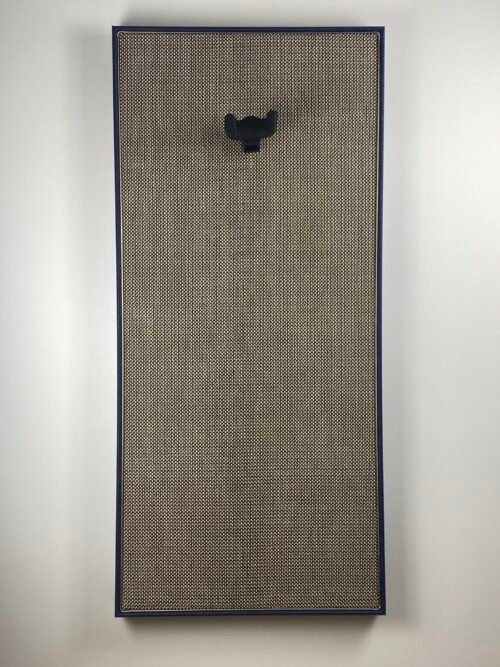 Akoestisch paneel met gitaar aan haak